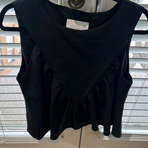 Cute black top from Anthropologie Size M.
